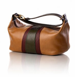 The Rosemary Barrel Bag in caramel and olive green handcrafted genuine leather with Regency Velvet lining and Italian hardware