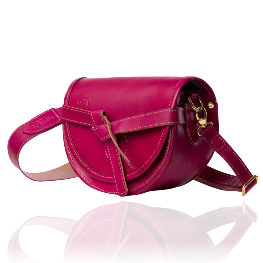 The Doreen Cross Body handcrafted in cerise rouge genuine leather, Regency Velvet lining and premium Italian hardware.