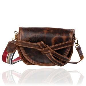 The Doreen Cross Body handcrafted in commando tan genuine leather with a navy, cream and burgundy striped woven strap, Regency Velvet lining and premium Italian hardware.