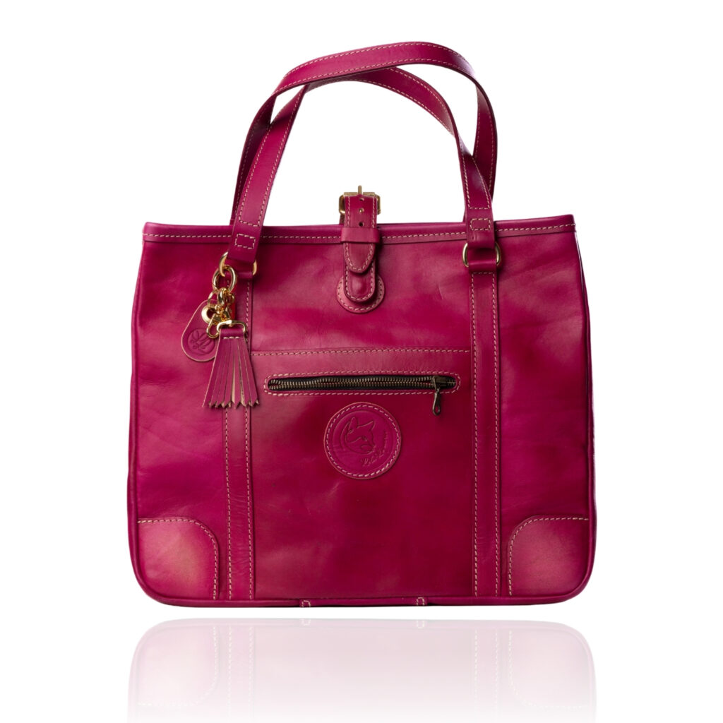 The Jean Tote handcrafted in hand-dyed Cerise Rouge genuine leather with Regency Velvet lining and premium Morini Italian hardware