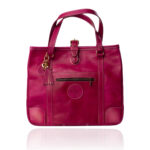 The Jean Tote handcrafted in hand-dyed Cerise Rouge genuine leather with Regency Velvet lining and premium Morini Italian hardware