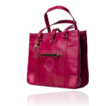 The Jean Tote handcrafted in hand-dyed Cerise Rouge genuine leather with Regency Velvet lining and premium Morini Italian hardware