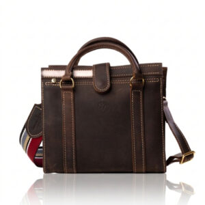 The Marilyn Mini Tote handcrafted in brown genuine leather with twin handles, shoulder strap, Regency Velvet lining and Italian hardware.