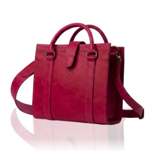 The Marilyn Mini Tote handcrafted in custom hand-dyed Cerise Rouge genuine leather with twin handles, shoulder strap, Regency Velvet lining and Italian hardware.