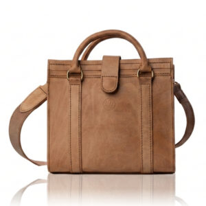 The Marilyn Mini Tote handcrafted in natural finish genuine leather with twin handles, shoulder strap, Regency Velvet lining and Italian hardware.